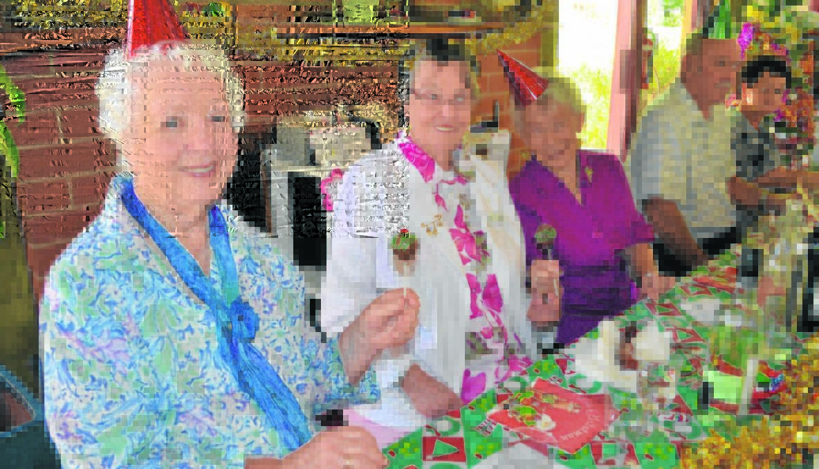 IMPRESSIVE: Kath Judson, Probus president Gwen O’Sullivan, and Gwen Williams were ver y impressed with the homemade lollipop cakes at the Probus Christmas lunch.