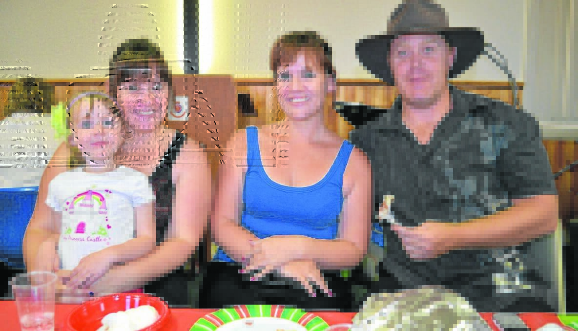 MUSIC: Abigail Gray (4), Michelle Severs, Tammy O’Brien and Phillip Shaw of the Cherry Capital Country Music Association were the entertainment at The Salvation Army's Christmas lunch.